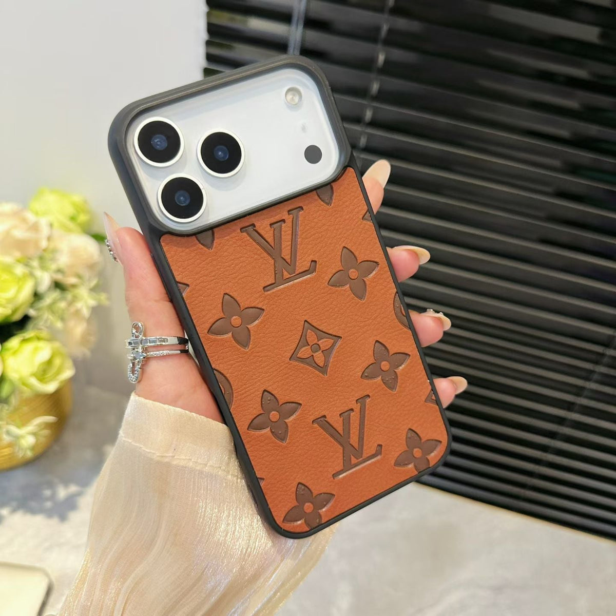 Louis Vuitton iPhone 17 Pro Max case in brown
