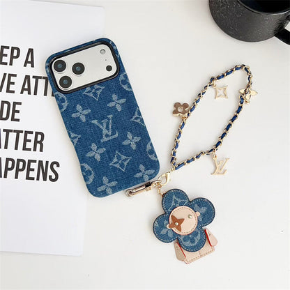 Luxury designer Louis Vuitton iPhone case with strap close-up
