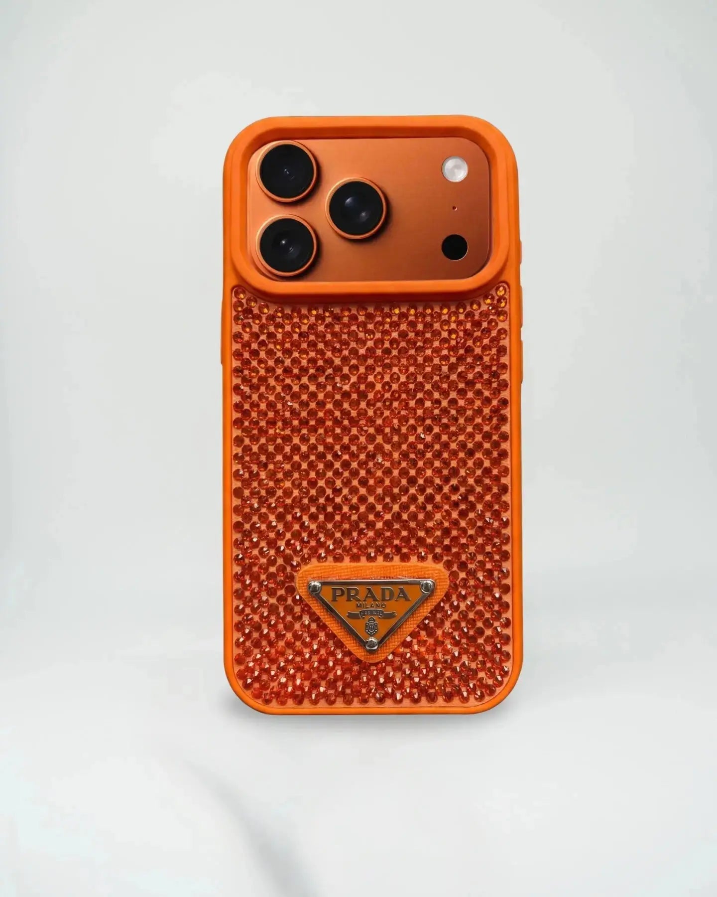 Orange prada phone case with Prada logo on a white background