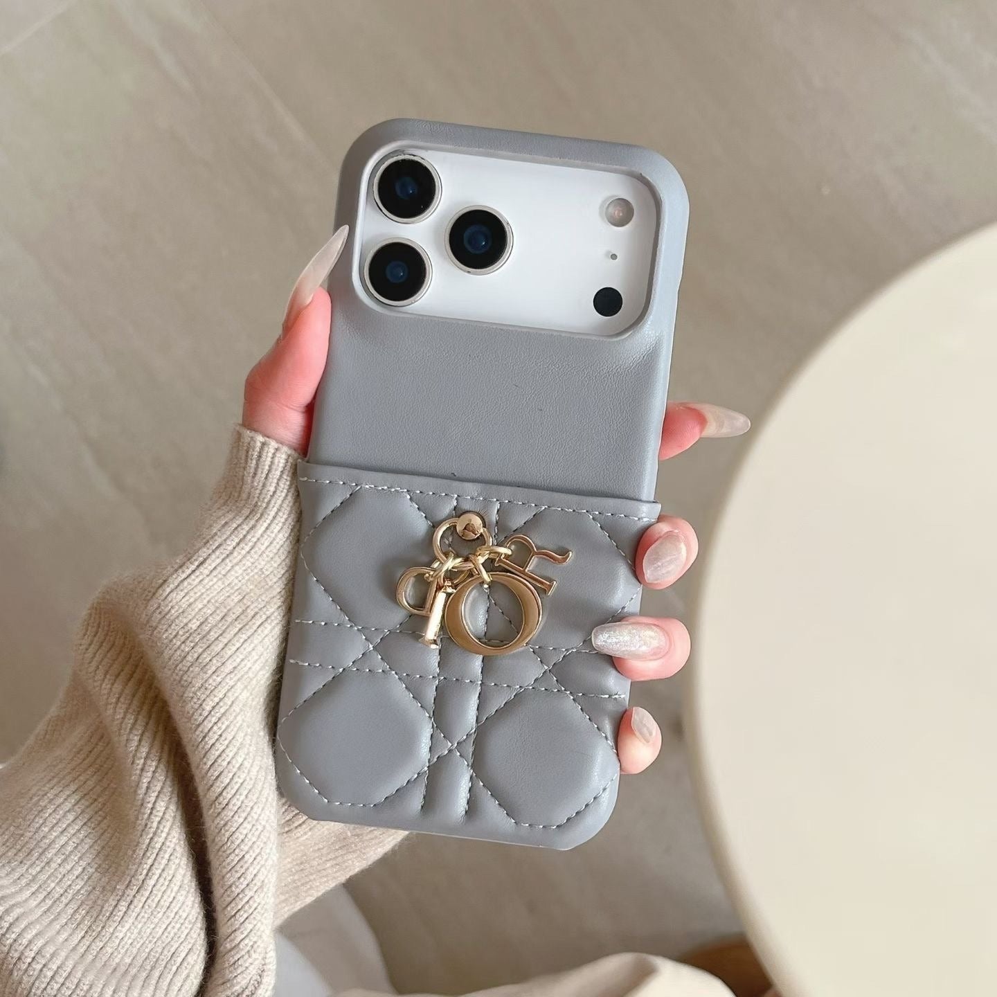 Grey Dior iPhone 17 Pro Max case quilted fashion design