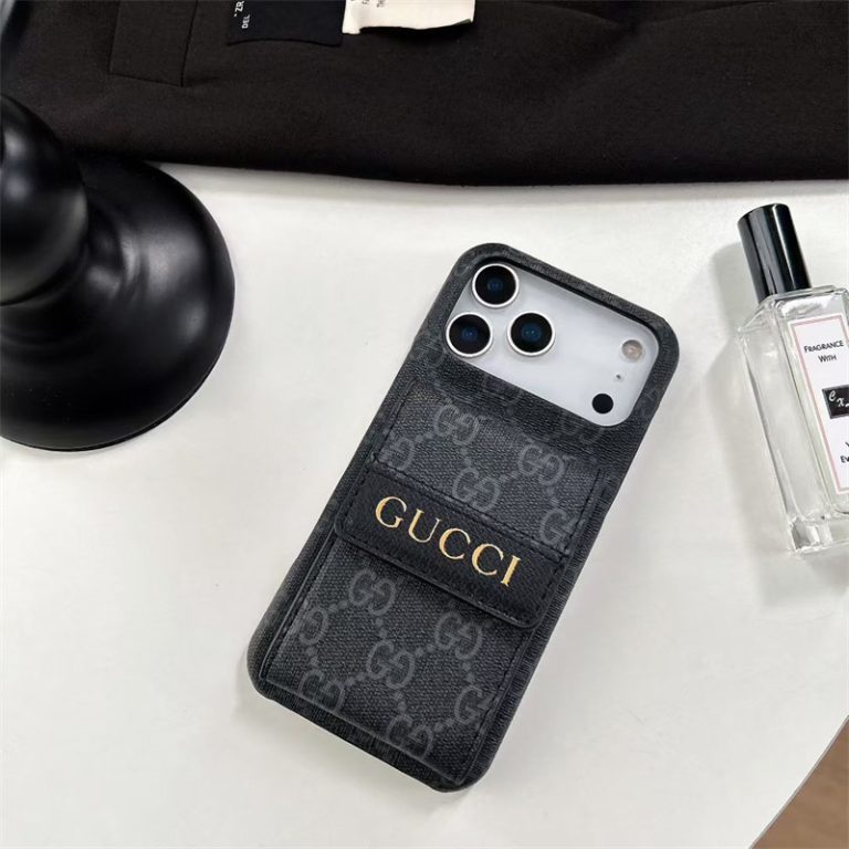 Gucci phone case on a white surface with a black background