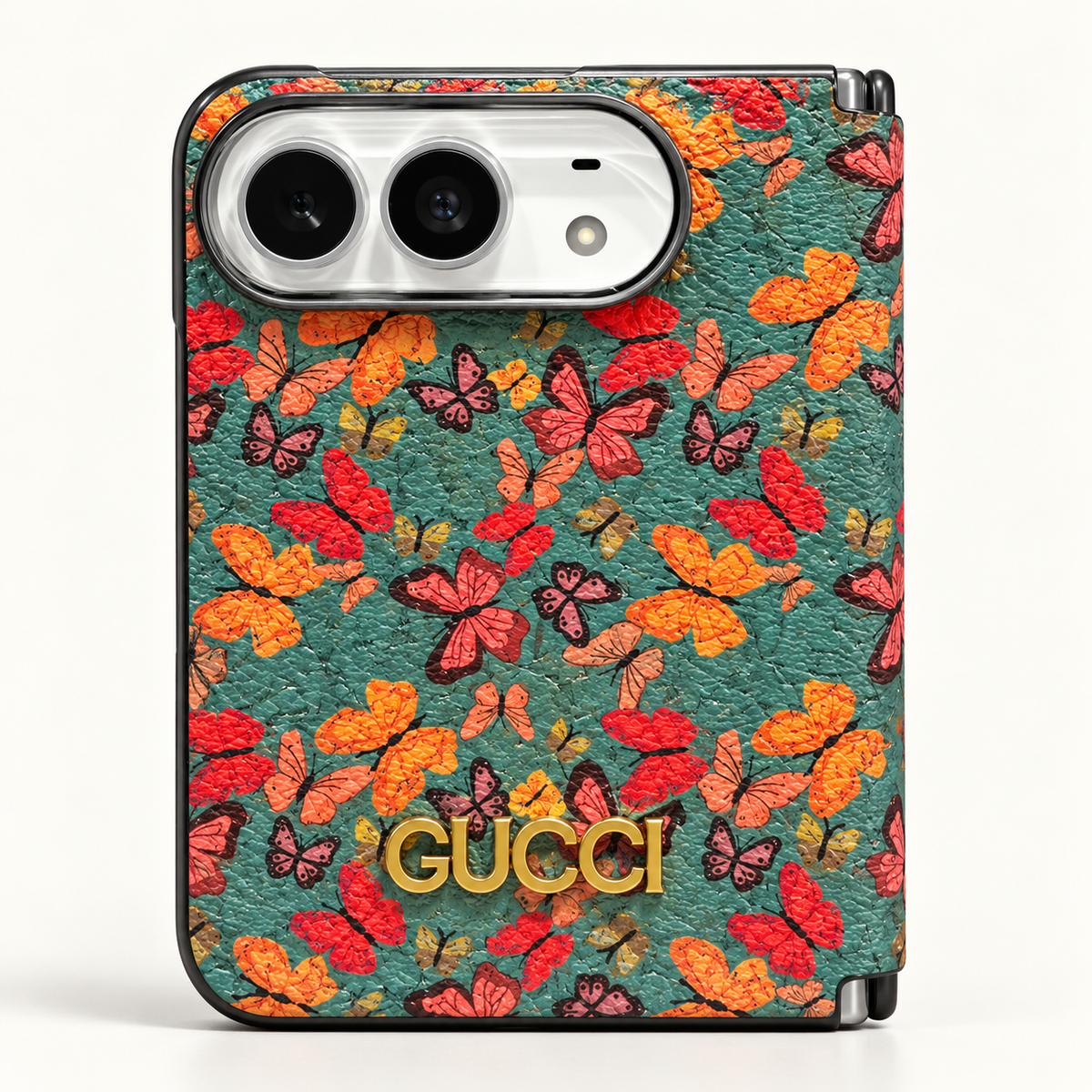Gucci Teal Butterfly iPhone Duo case, rear view showing the patterned exterior and camera opening.