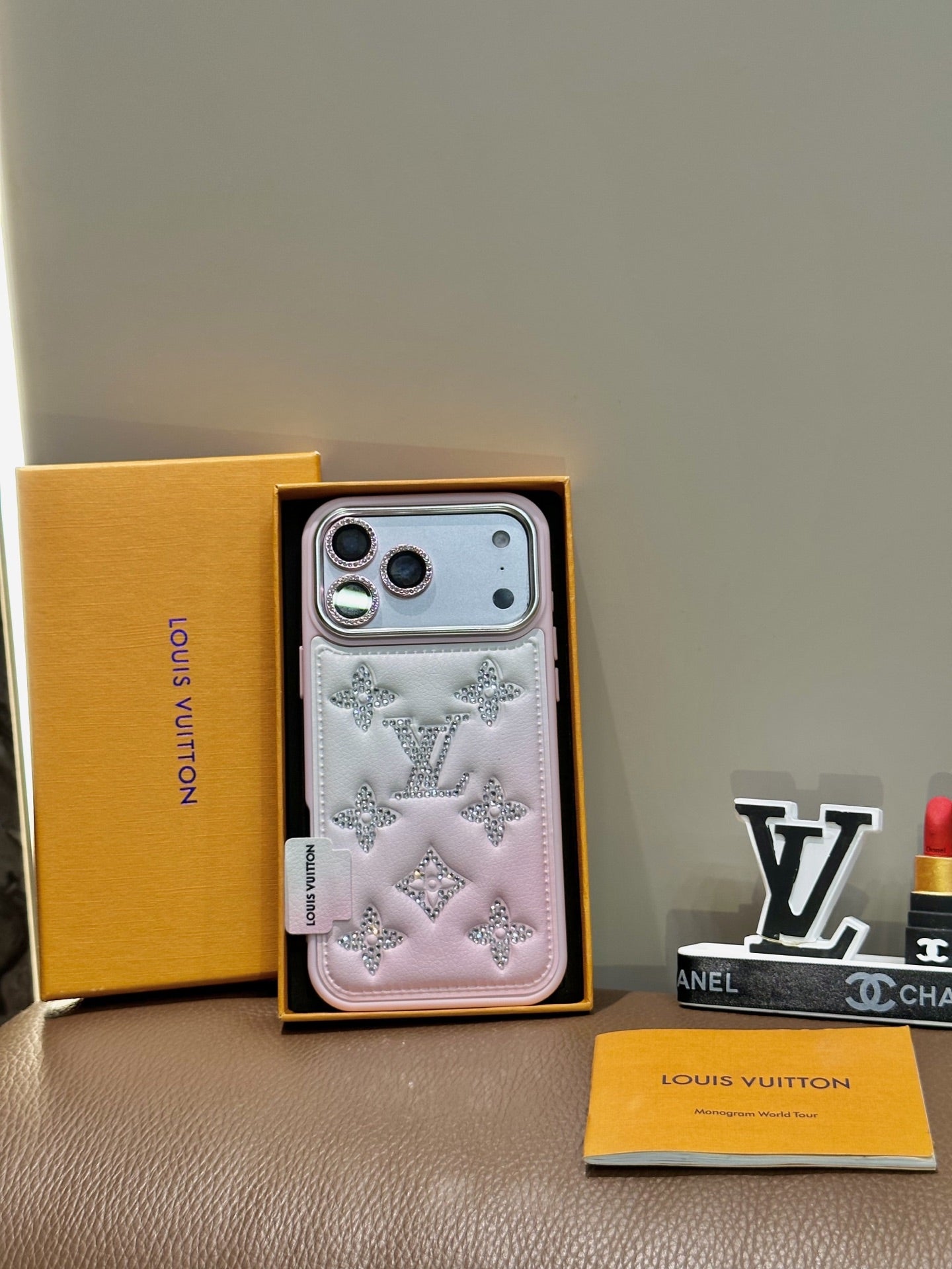 Louis Vuitton crystal blush pink iPhone 17 Pro Max case with rhinestone details